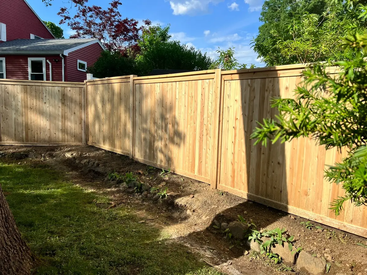 Wood fence installation service for residential properties